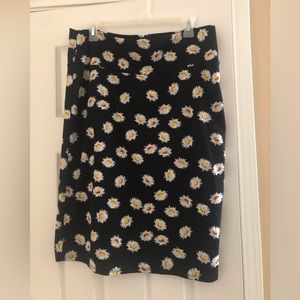 Black skirt with daisy pattern